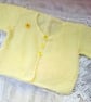 Girl's Knitted White Textured Cardigan with Yellow Daisy Embellishments - Image 1