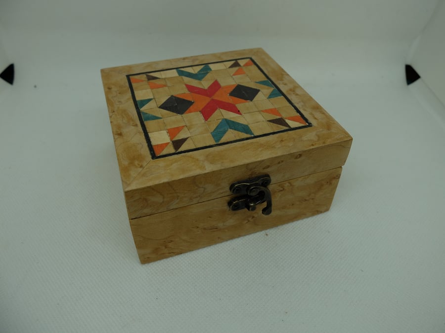 Navajo-inspired hand veneered lidded wooden box in Birds eye maple