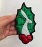 Upcycled embroidered holly leaf and berries hare home decoration.  - Image 1
