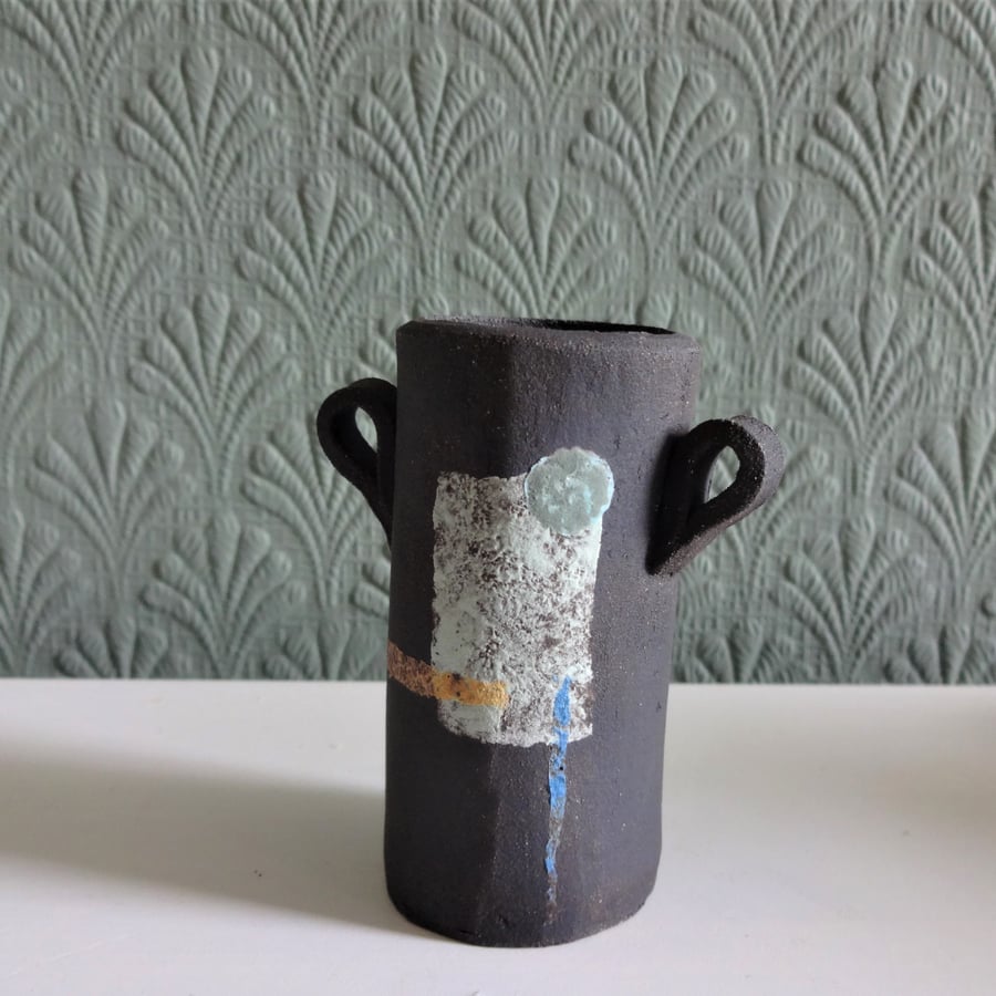 Tiny bud vase, matt black ceramic, abstract mid-century motif. Perfect gift