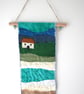 Landscape textile art hanger