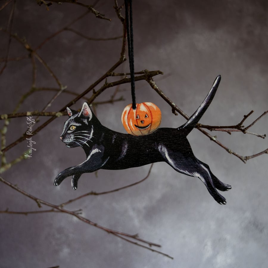 Black cat with a pumpkin wooden hanging decoration 