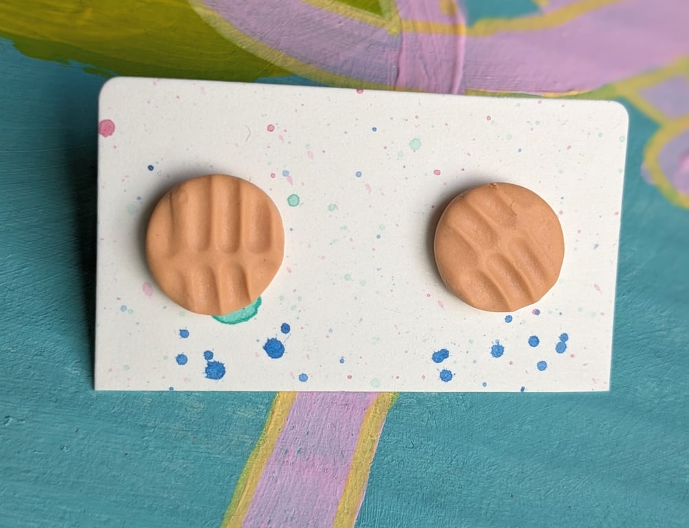 Orange textured large stud earrings. 