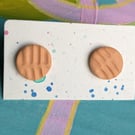 Orange textured large stud earrings. 