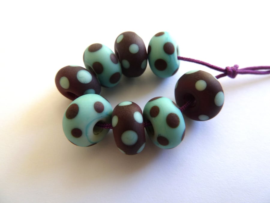 red and blue spotty lampwork glass beads