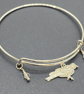 Silver plated bird charm bangle with white topaz stones - Image 1
