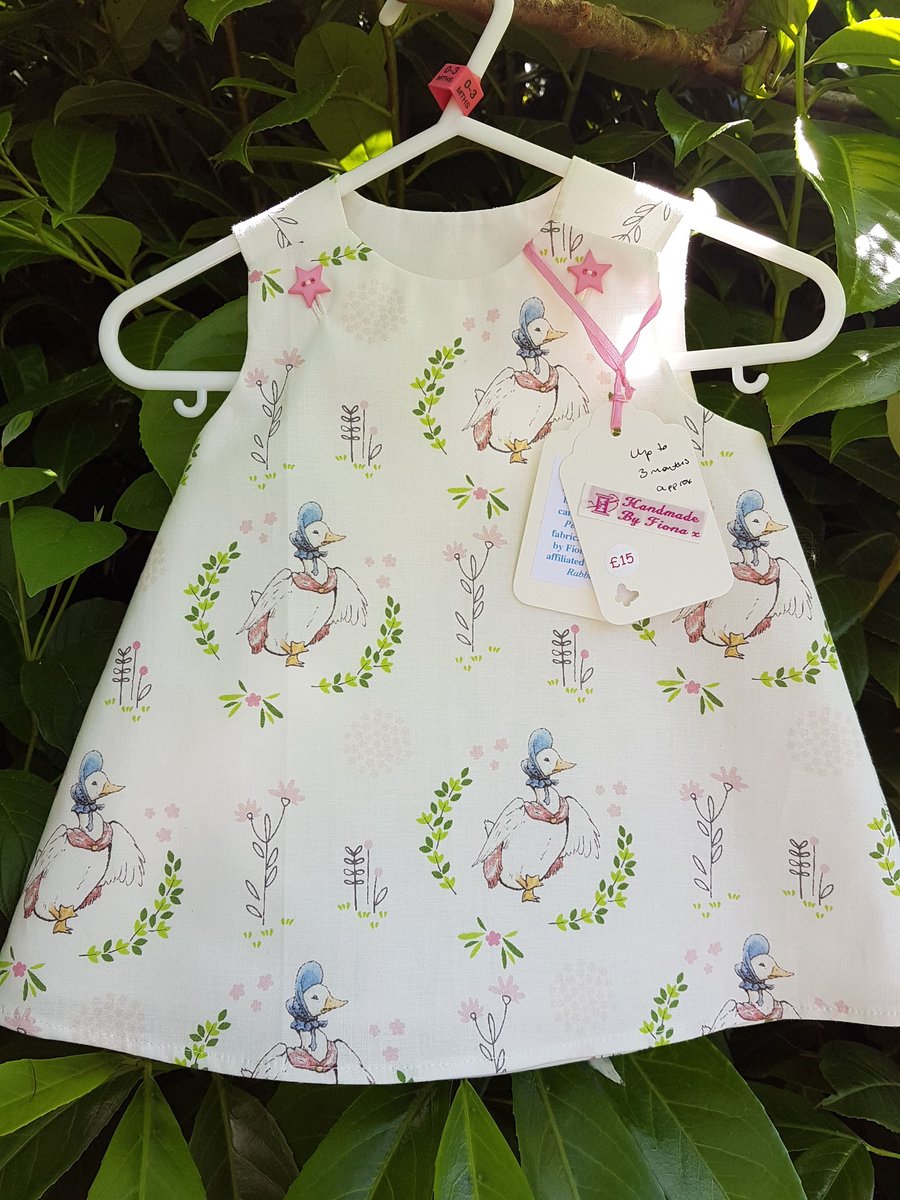 Age: 0-3m. White Duck Print cotton dress. 