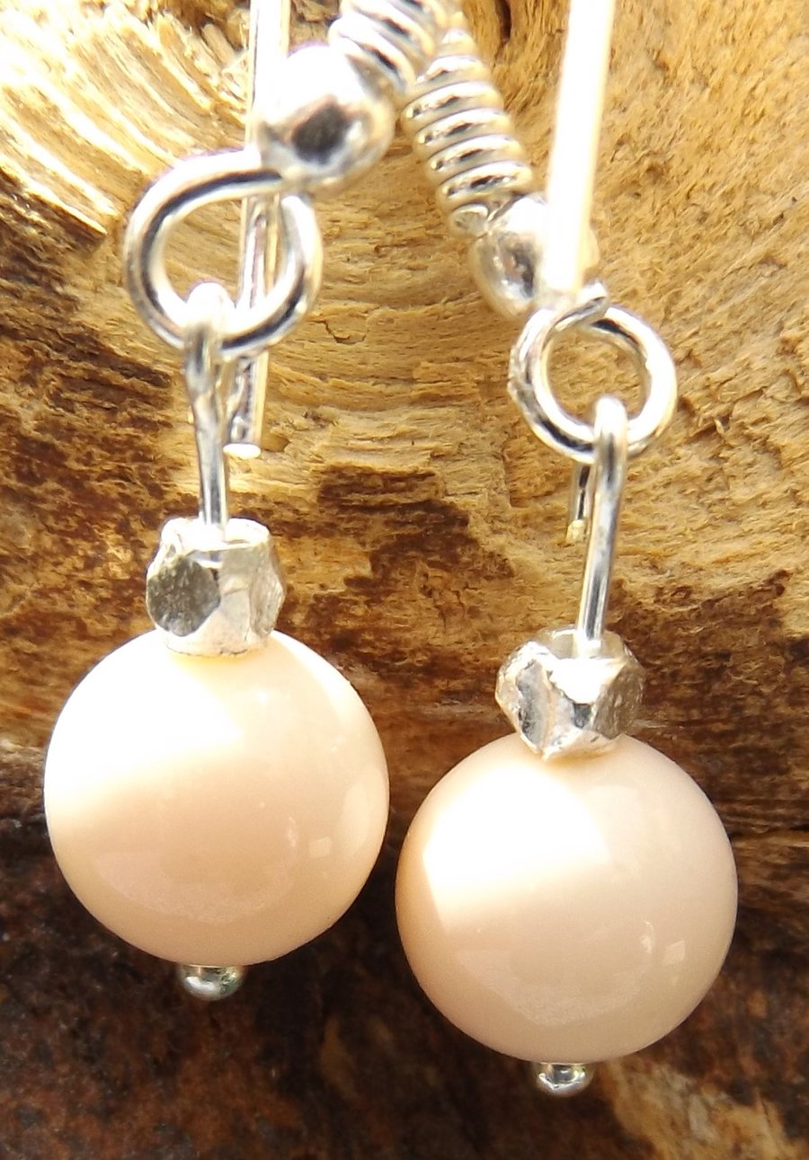 Peach shell pearl earrings