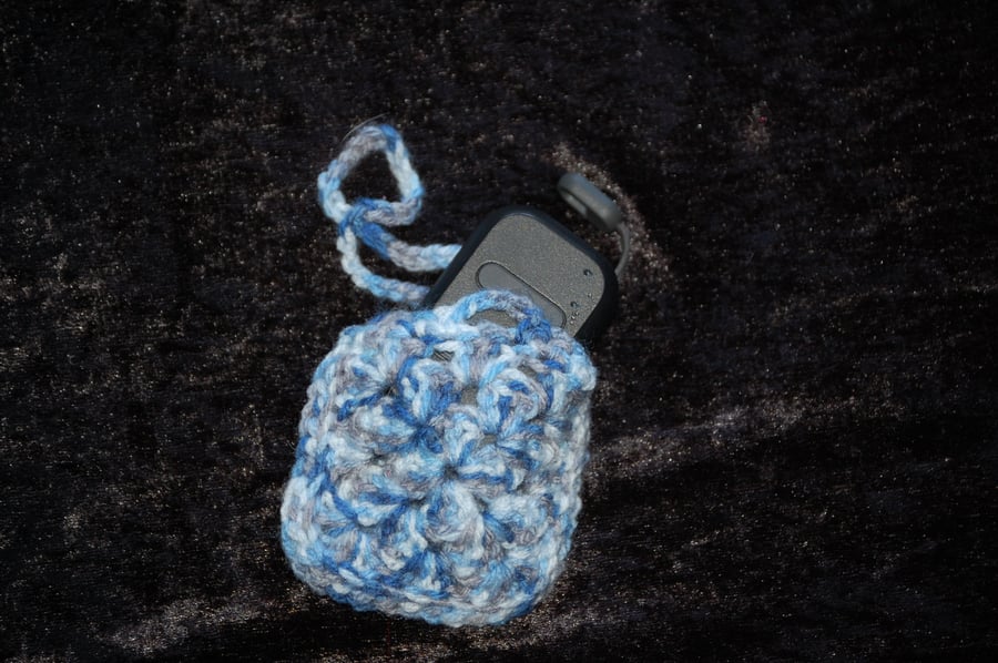 small crocheted pouch great for airpods or earbuds case