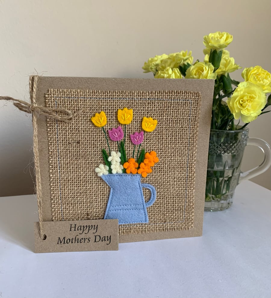 Mother’s Day Card. Blue jug with colourful flowers. Wool felt. Handmade Card.