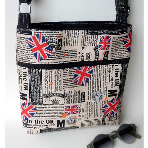 Tan crossbody bag with adjustable straps – music newsprint fabric