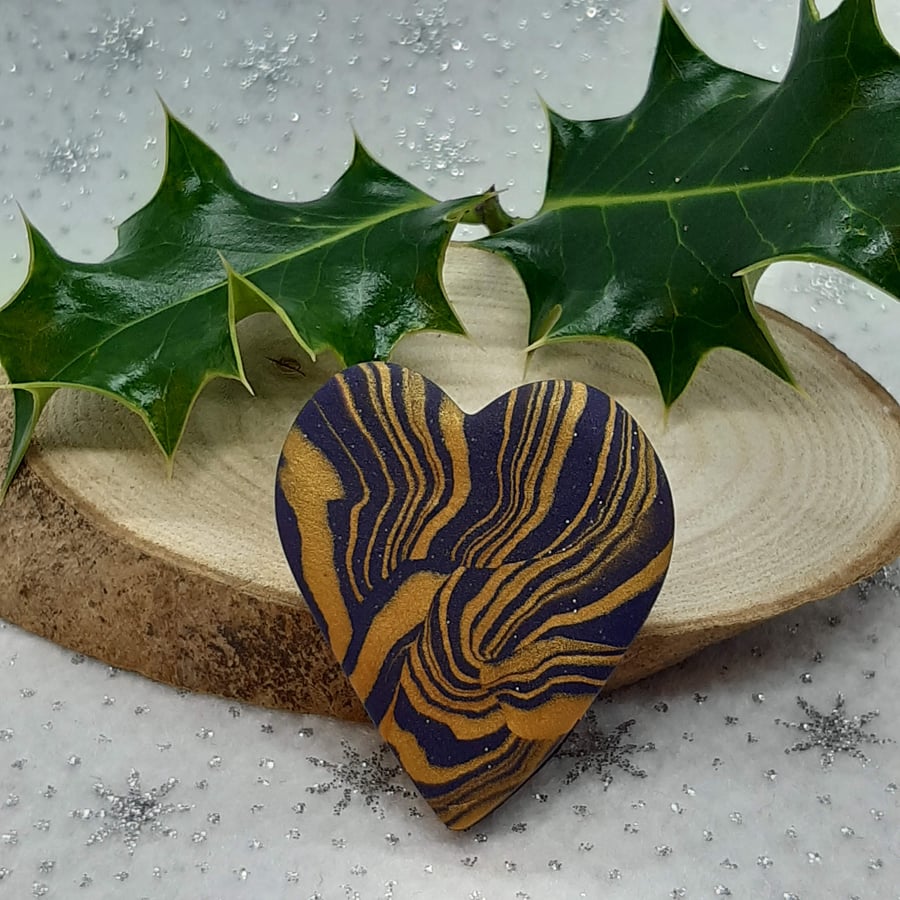 Navy and gold heart shaped polymer clay brooch