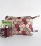 Make up or toiletries bag in a vintage patchwork print design.