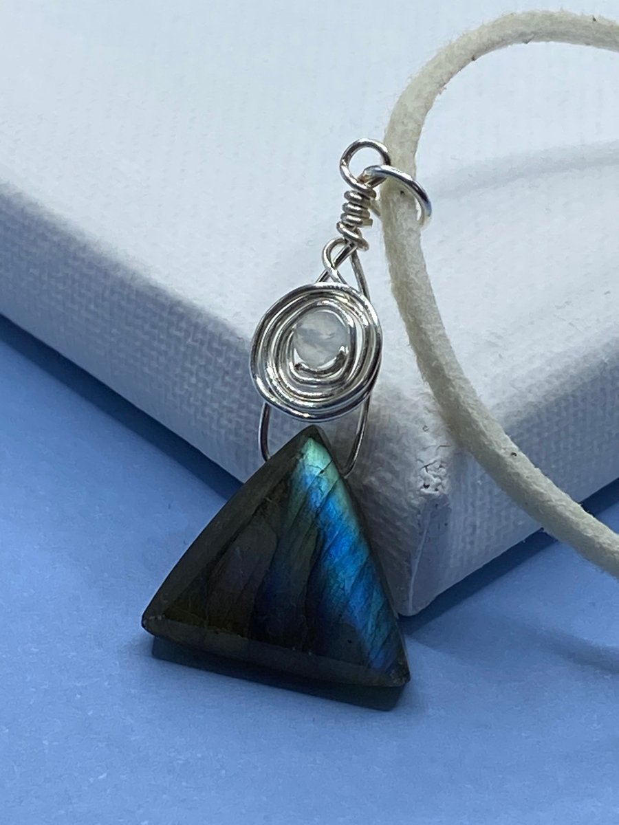 Triangular labradorite stone pendant on cream faux suede cord
