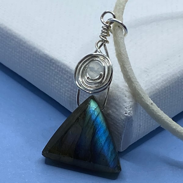Triangular labradorite stone pendant on cream faux suede cord