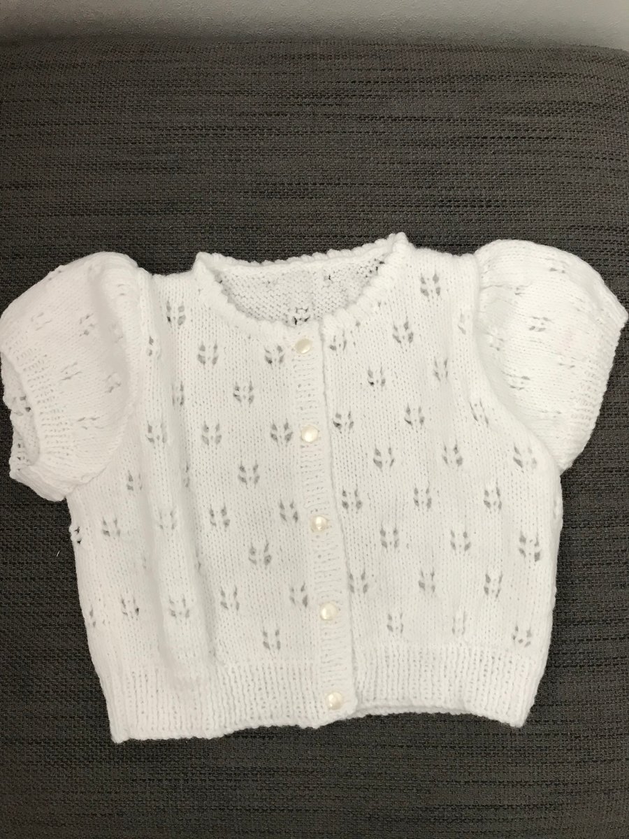Short sleeved patterned baby cardigan