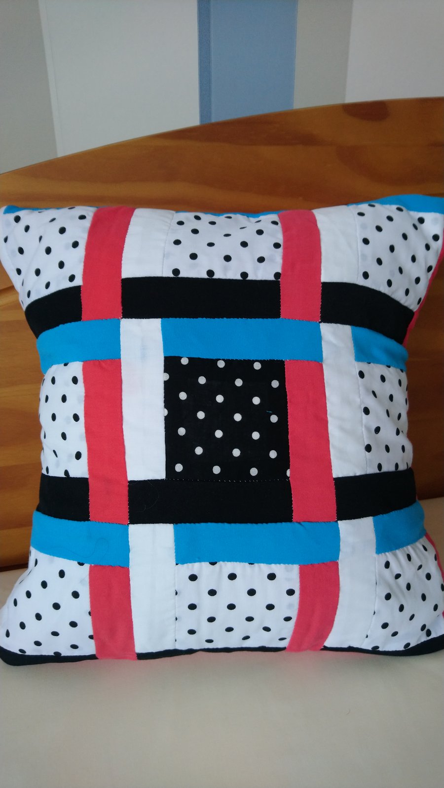 Bright cushion cover, in red, turquoise, black and white. 14x14ins 36x36cm