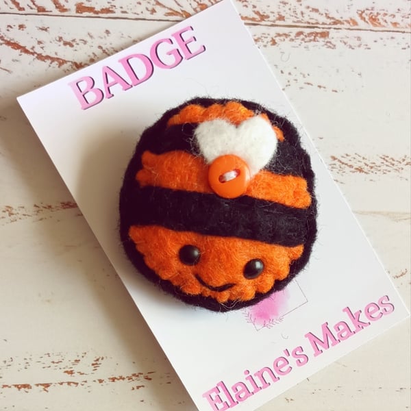 Hand sewn wool blend felt 'busy bee' badge on a printed backing card (orange)