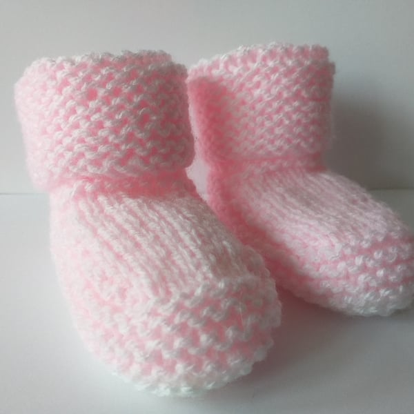 A pair ofHand knitted and  a pair of crochet baby bootees 