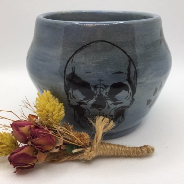 Small stoneware bowl decorated with skulls and ravens!