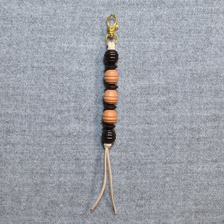 Bag Charm – Shades of Brown Wood Beads on Beige Suede Cord