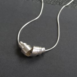 Silver birch bark scroll pendant - textured recycled silver