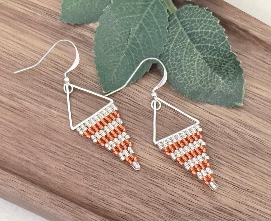 Vivid orange and silver beadwork triangle earrings