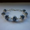 BLUE, WHITE, CRYSTAL AND SILVER - PORCELAIN BEAD BRACELET.