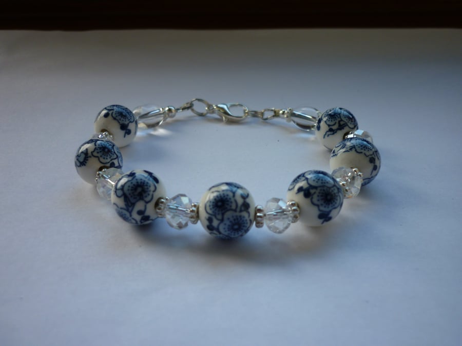 BLUE, WHITE, CRYSTAL AND SILVER - PORCELAIN BEAD BRACELET.