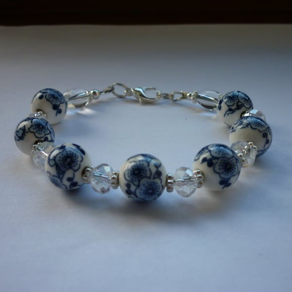 BLUE, WHITE, CRYSTAL AND SILVER - PORCELAIN BEAD BRACELET.