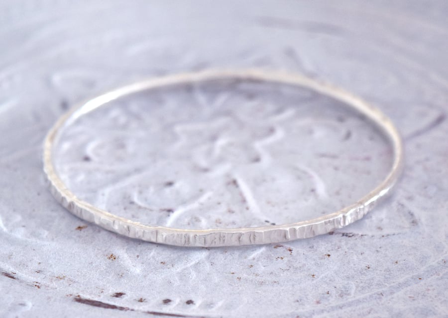 Sterling Silver Cross Hammered Narrow Bangle at MidasTouch Jewels