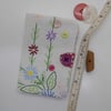 Sewing needle case with repurposed embroidery and pink spotty fabric 