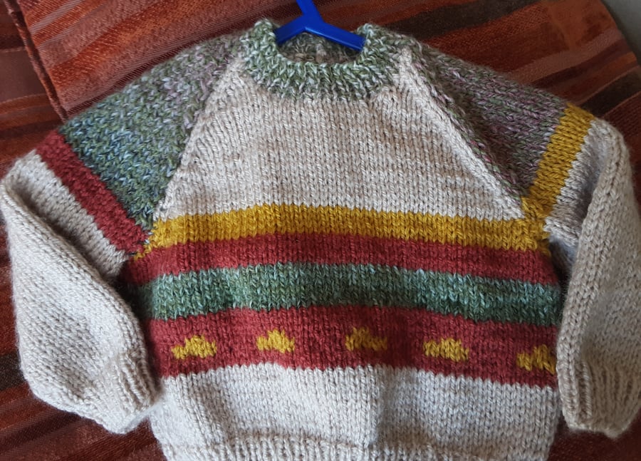 Hand knitted beige patterned baby jumper
