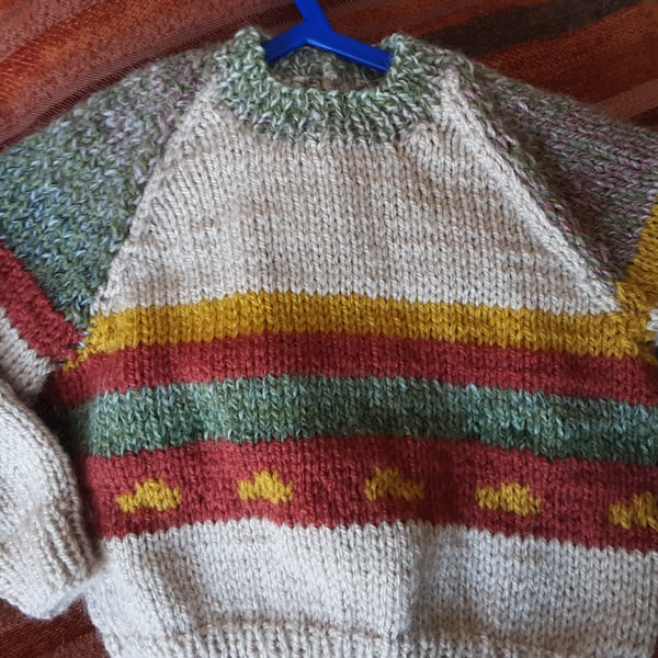 Hand knitted beige patterned baby jumper