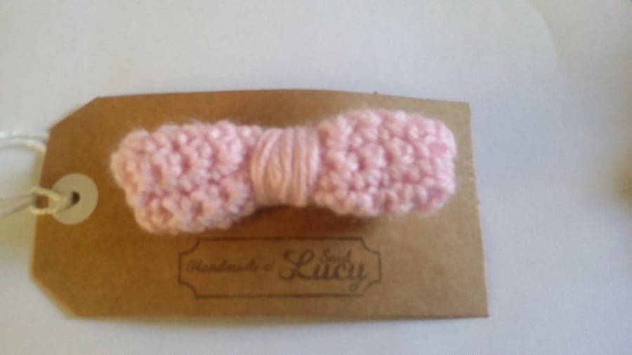 Light pink crochet bow
