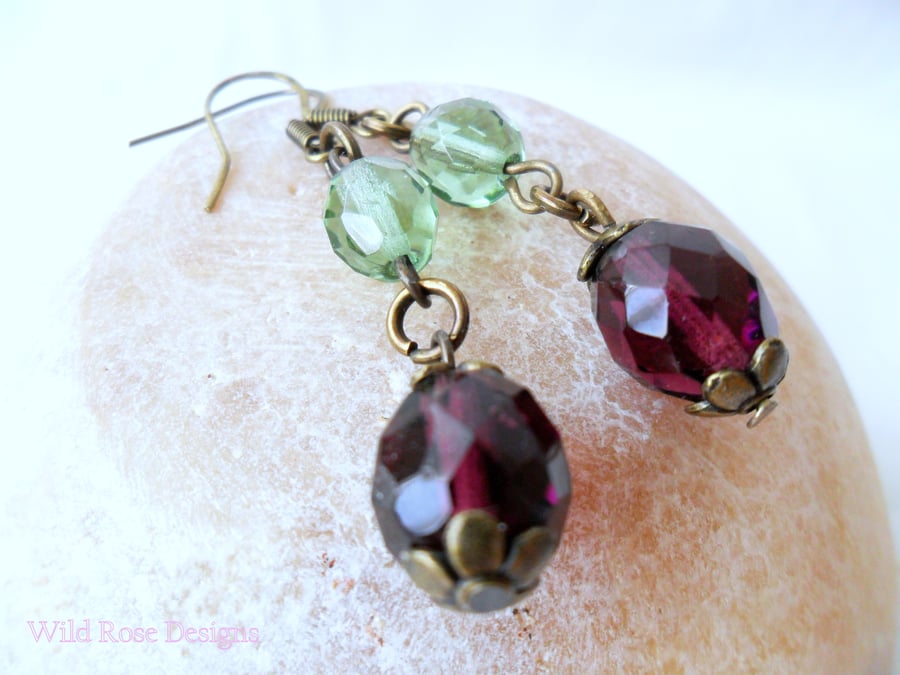 Purple and green dangle earrings