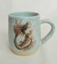 A handmade Mermaid and seashells mug, stoneware cup, turquoise mug