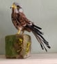 Needle felted male kestrel perked on stump