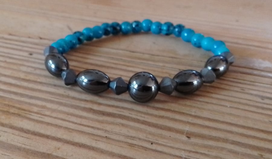 Handmade bracelet made using pre-loved beads. Small size.
