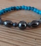 Handmade bracelet made using pre-loved beads. Small size.