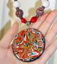 Vintage-Inspired Necklace with a Unqiue Oval Pendant Design & Marbled Beads