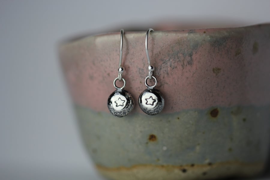 Sterling silver pebble earrings - star design