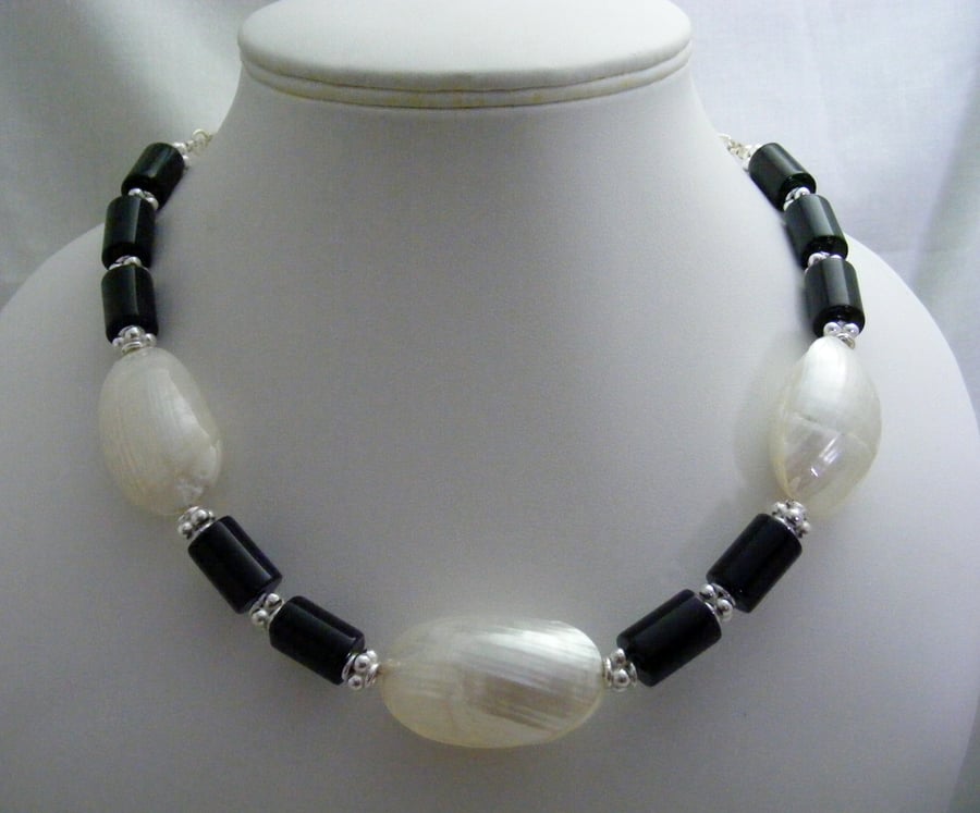 Black Onyx and White Shimmer Puffy Shells Necklace.
