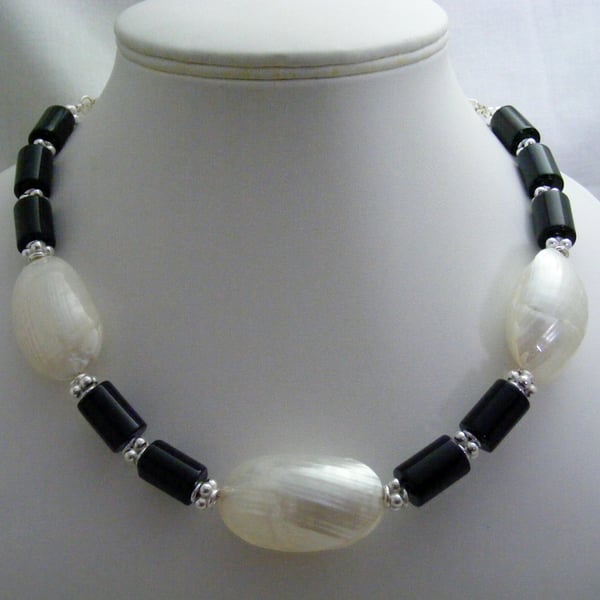 Black Onyx and White Shimmer Puffy Shells Necklace.