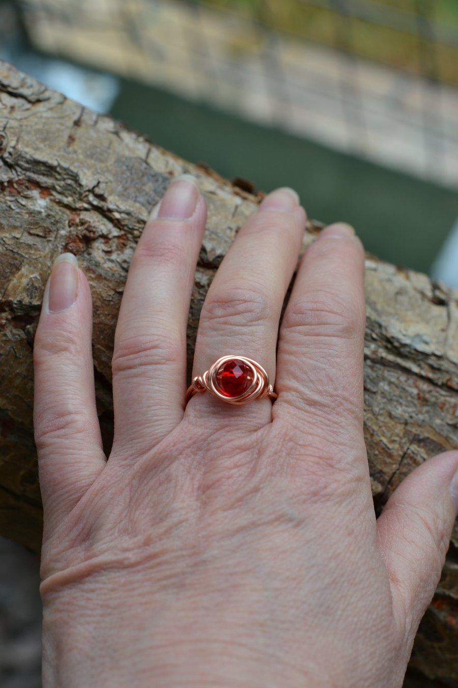 Copper Wire Wrapped Ring With Faceted Red Bead