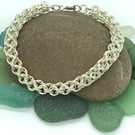 Silver Inverted Round Weave Bracelet.