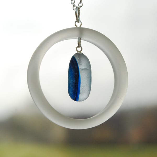 Ring pendant with blue sea glass