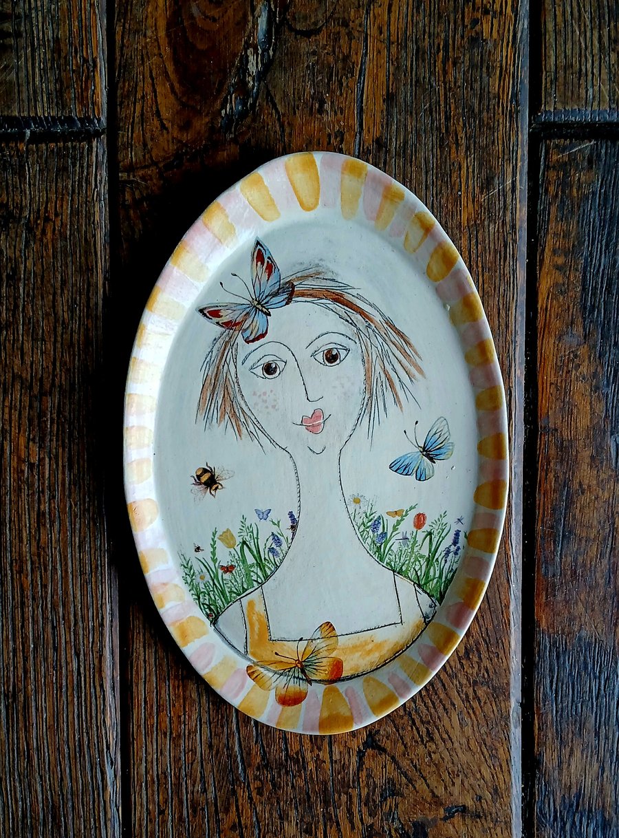 Figurative shallow wall plaque 