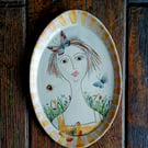 Figurative shallow wall plaque 