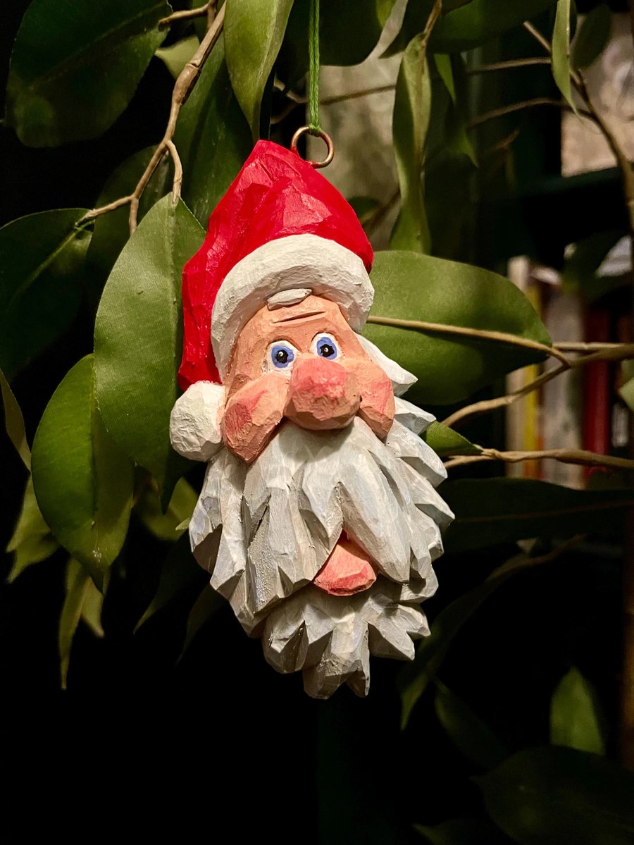 Hand carved wooden traditional Santa Christmas decoration